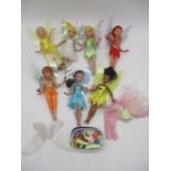 A collection of seven Disney fairies dolls with flutter wings and accessories including two