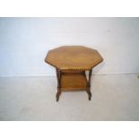 An Edwardian mahogany octagonal occasional table.