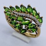 A 9ct gold tourmaline and diamond ring in the form of a leaf