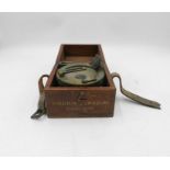 A wooden cased military issue medium landing compass.