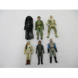 A collection of six Star Wars figurines including Darth Vader (dated 1977), AT-AT Commander, Rebel