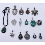A collection of 925 silver and silver mounted pendants