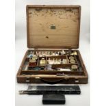 A Windsor & Newton vintage paint box with some contents along with brushes etc.