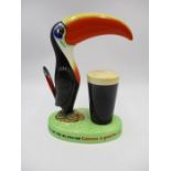 An original Carlton Ware Guinness Toucan advertising figure with "If he can say as you can, Guinness