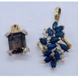 Two 9ct gold pendants both set with gemstones and diamonds, total weight 4g