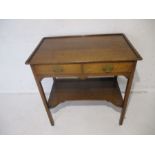 An oak side table, with two drawers, length 76cm, height 76cm.