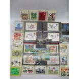 A large collection of stamp postcards, includes a small selection of travel postcards.