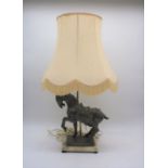 A table lamp in the form of a horse, on a marble plinth, with shade.