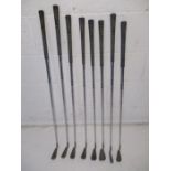 A set of Ping Karsten golf irons, clubs include irons 4 to 9, sand wedge and pitching wedge