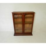 A Victorian mahogany glazed display case, A/F, length 90cm, height 114cm.