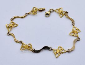 A 9ct gold bracelet, links in the form of butterflies, weight 3.3g