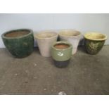 A five various garden plant pots, some glazed.