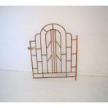 An Art Deco metal garden gate.