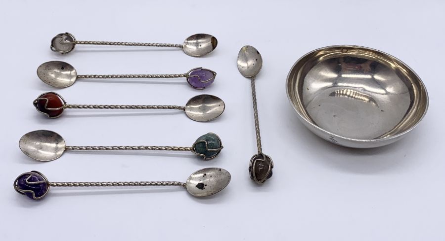 A small hallmarked silver dish along with a set of gem set coffee spoons