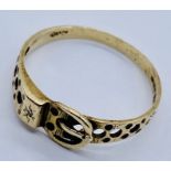 A 9ct gold buckle ring set with a small diamond, weight 1.6g
