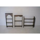 Three wall hanging oak shelves.