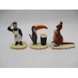 A collection three vintage Carlton Ware ceramic Guinness figures including a kangaroo, toucan with