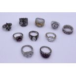 A collection of ten 925 silver gem set rings