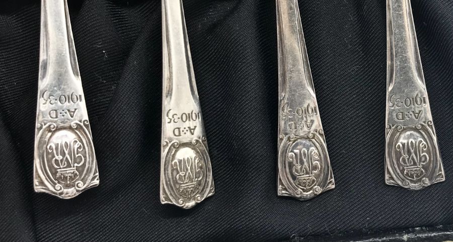 A cased set of hallmarked silver coffee spoons celebrating King George V silver jubilee along with a - Image 3 of 4