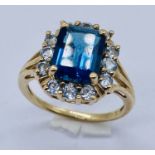 A 9ct gold gem set dress ring