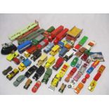 A collection of loose die-cast vehicles including Dinky Toys, Matchbox Models of Yesteryear,