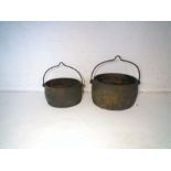 Two cast iron Cauldrons, both with faint makers marks.