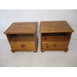 A pair of modern pine bedside tables, with single drawers.