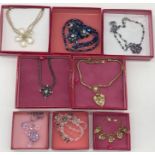 A collection of boxed Butler & Wilson necklaces and bracelets