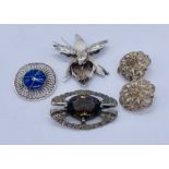 Four silver brooches including a lapis lazuli brooch marked 950 and an Edinburgh brooch marked AH "