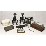 A collection of various items including pair of Arts & Crafts style fire dogs, writing set, silver
