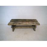 Two weathered wooden garden benches, length 155cm.