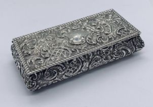 A hallmarked silver repousse box, length approx 11.75cm