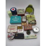 A collection of various tins including Oxo, Players Navy Cut, Southern Comfort, Stewart's Scottish