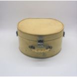 A vintage cream leather hat box, marked BHS.
