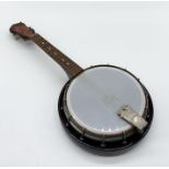 A George Formby banjolele - one string missing