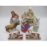 A small collection of various ceramic figurines including a Beswick Jersey "Dunsley Coy Boy",