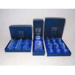 A quantity of boxed Royal Scot Crystal cut glass, comprising a set of six tumblers, a set of six