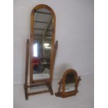 A pine free standing mirror plus a pine dressing table mirror.