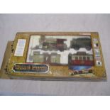 A boxed Playgo Western Express including locomotive, coal tender, freight car, caboose and track