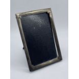 A hallmarked silver photo frame