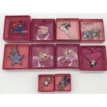 A collection of boxed Butler & Wilson jewellery including necklaces, brooches, key chains,