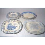 A quantity of blue and white platters.