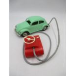 A 1950’s West German Mignon remote control battery powered Volkswagen Beetle