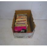A quantity of 7" vinyl records, including Buddy Holly, Everly Brothers, Bobby Vee, Boney M, Hot