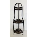 A folding metal three tiered plant stand
