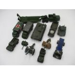 A small collection of vintage play worn die-cast military vehicles including Dinky Toys, Corgi etc