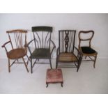 Four various chairs, along with a footstool.