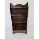 An Edwardian mahogany waterfall effect bookcase, with single drawer, length 56cm, height 112cm.