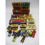 A collection of die-cast vehicles (boxed and loose) including Matchbox Models of Yesteryear, Lledo