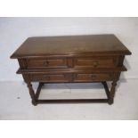 A small oak sideboard with three drawers